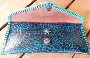 LEATHER LACED CLUTCH